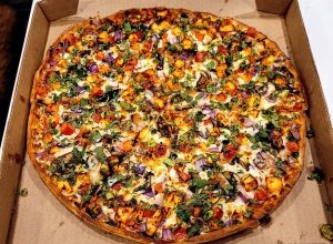 Large Shahi Paneer Pizza + 1 Dip + 1 Pop